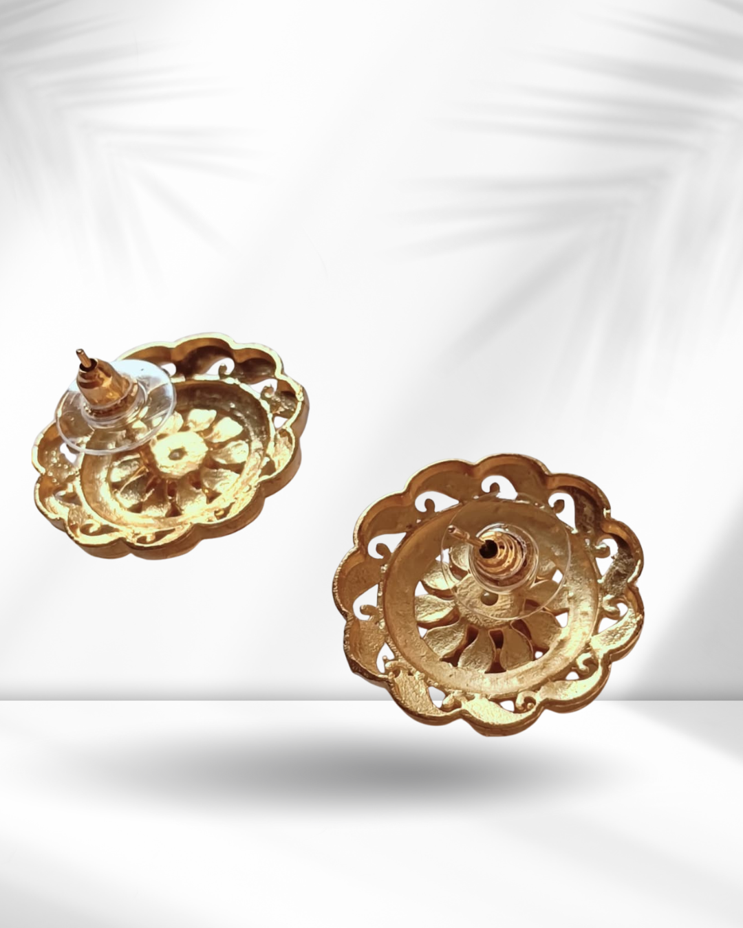 Golden Floral Stud Earrings with Red Stone Center - Image 1